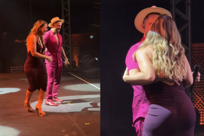 Vídeo! De vestido coladinho, Paolla Oliveira dança e beija Diogo Nogueira em show
