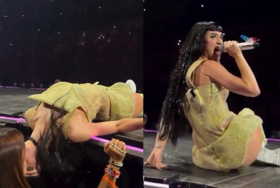 Solteira, Katy Perry dá selinho em fã durante show