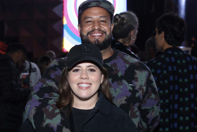 Tati Machado e o marido prestigiam festival na Zona Sul do Rio