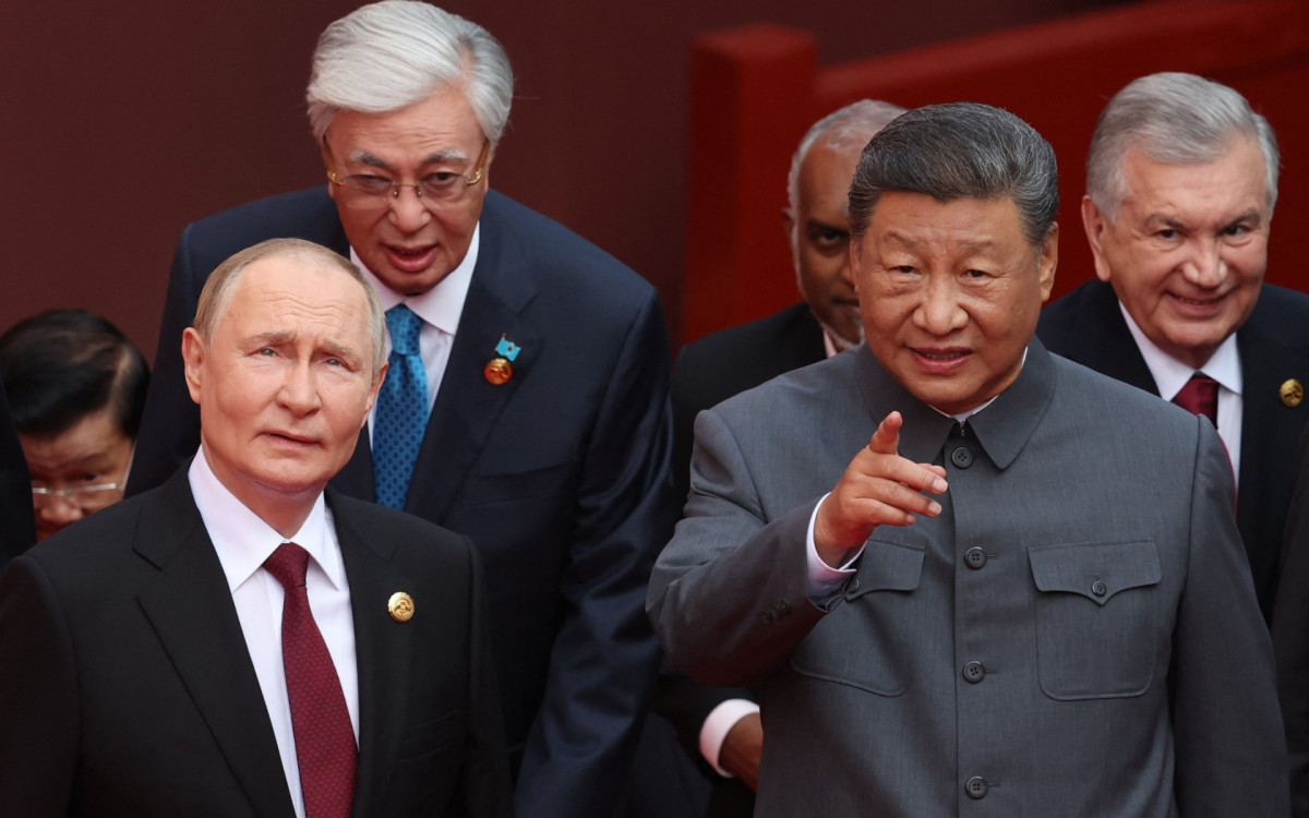 Presidente russo Vladimir Putin e o presidente chinês Xi Jinping  - AFP