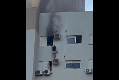 Vídeo: Jovem sobe em ar-condicionado durante incêndio para salvar mulher e criança no Paraná