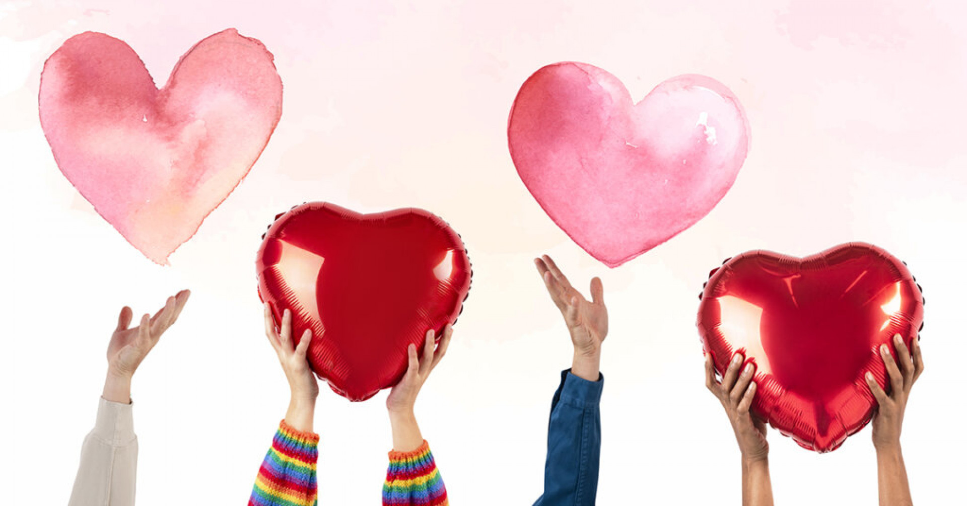 People holding hearts for Valentines&rsquo; celebration
