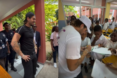 Zé Felipe visita colégio em Angola e doa kits escolares