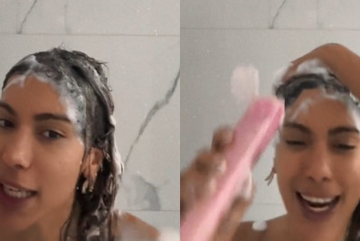 No banho, Anita dança ao som de nova música