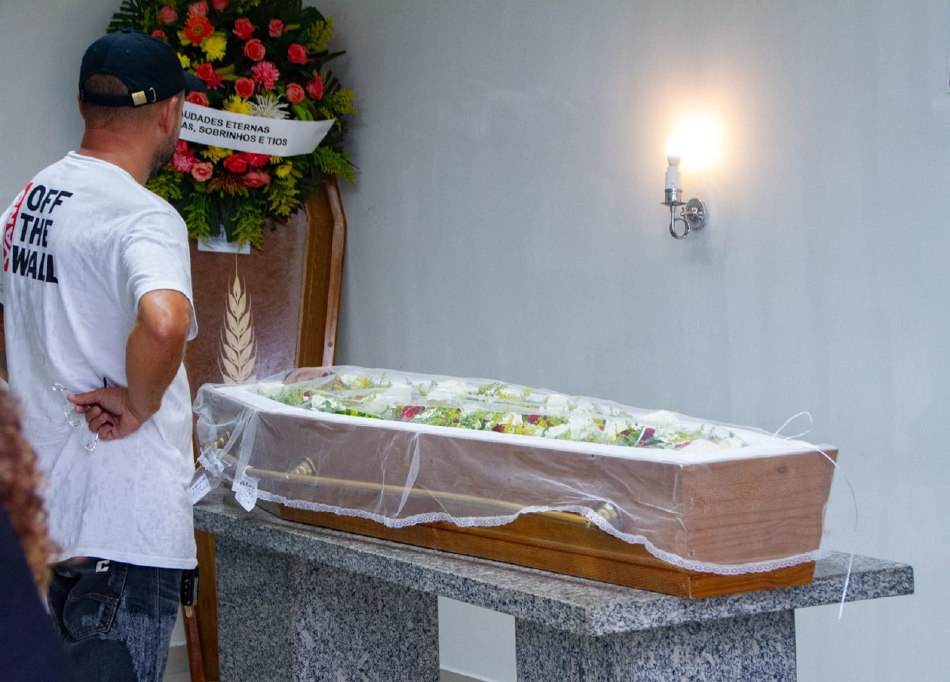 O corpo do entregador de pizzas Marcelo Julio da Silva, de 52 anos, foi velado e sepultado nesta sexta (23) - Érica Martin/Agência O Dia