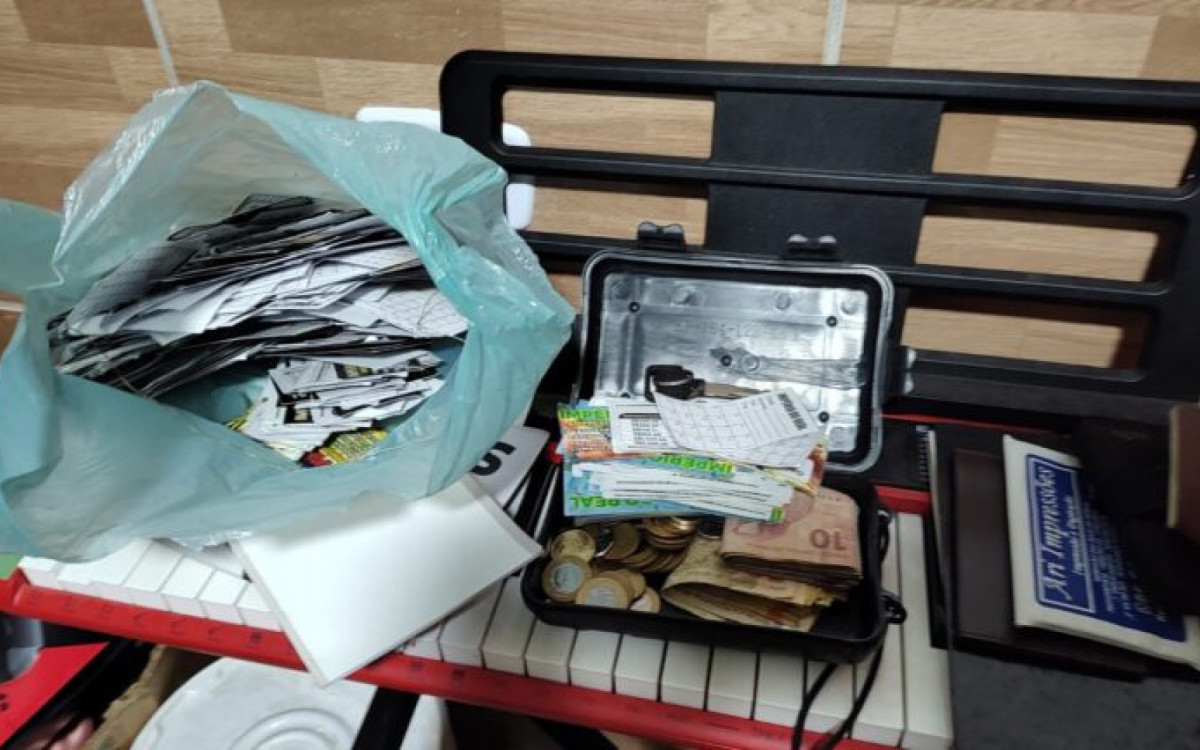 Polícia apreendeu dinheiro, celulares, documentos e identidades falsas   - Divulgação/SSP-PI