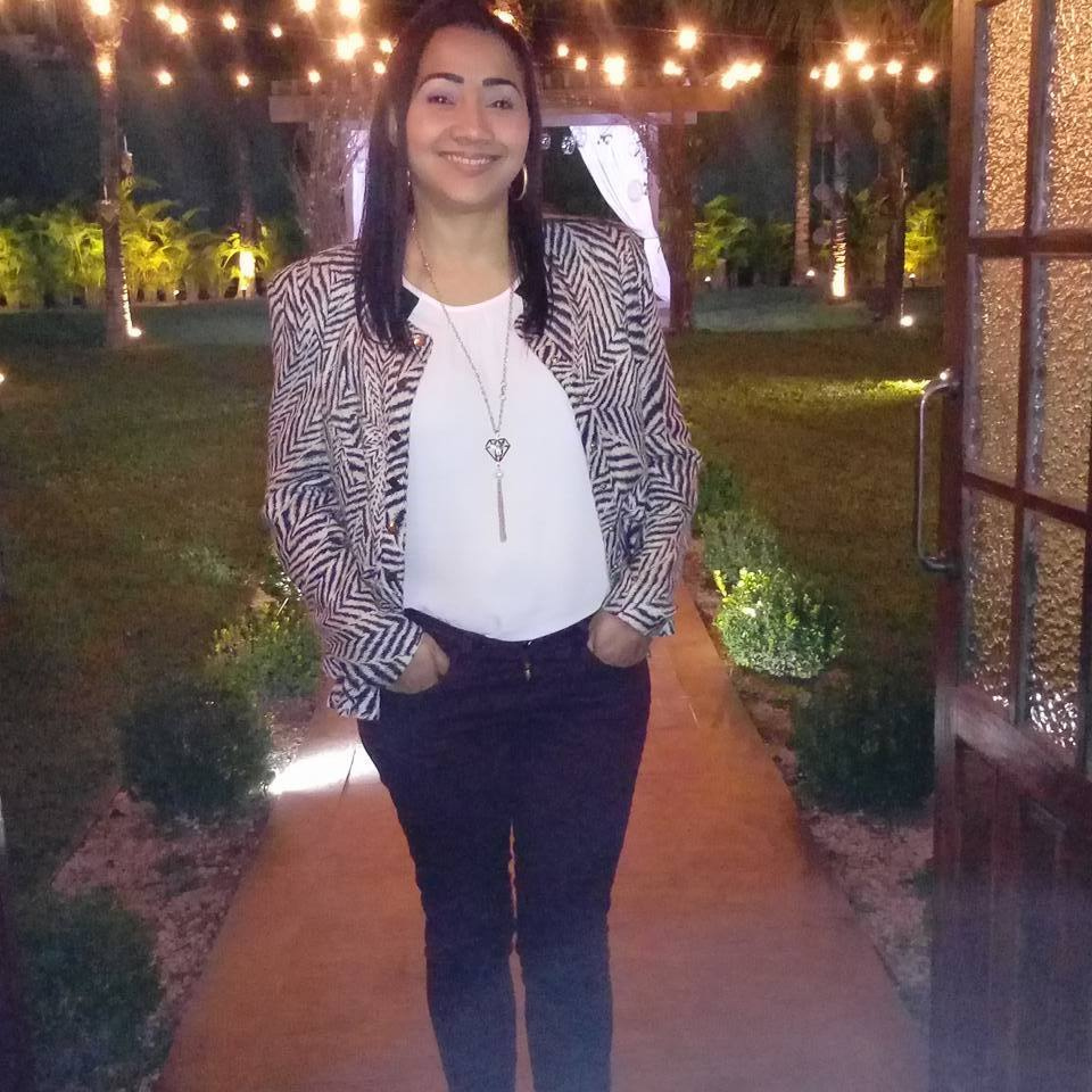 Lívia Lima Vieira da Silva, de 49 anos, morreu baleada em Manguariba, na Zona Oeste do Rio