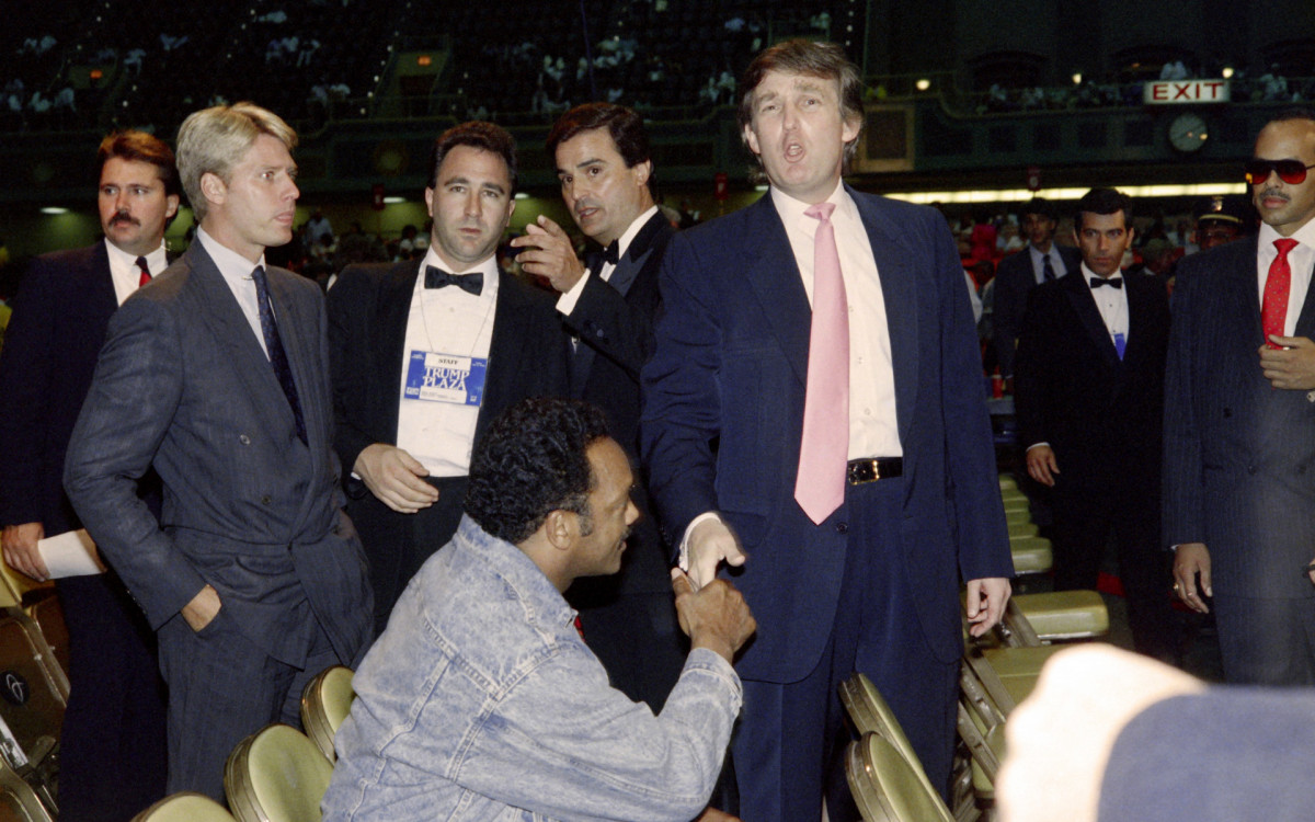 Presidente Trump e o reverendo Jesse Jackson - AFP