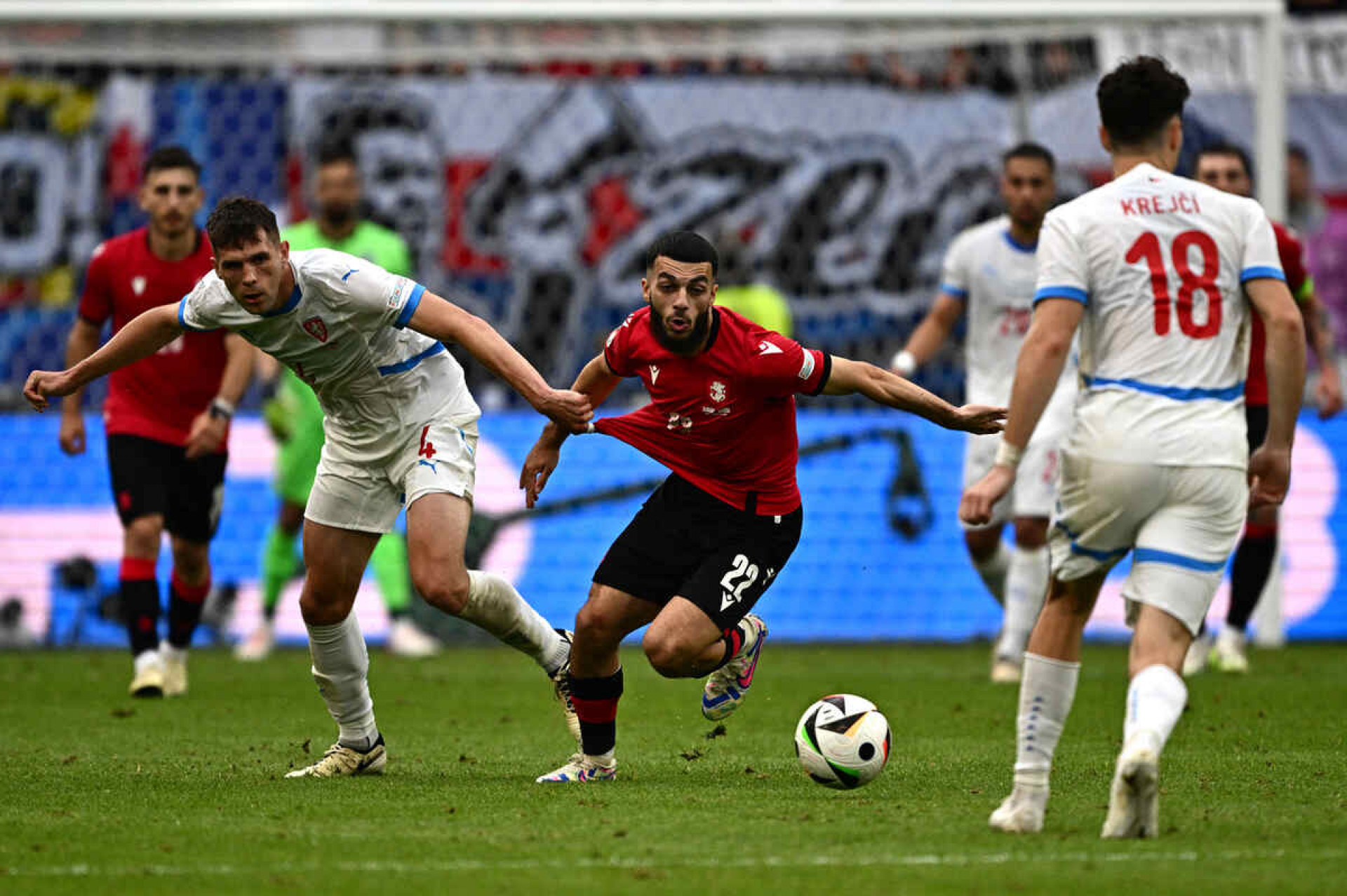 (From L) Czech Republic's defender #04 Robin Hranac and Georgia's forward #22 Georges Mikautadze fight for the ball during the UEFA Euro 2024 Group F football match between Georgia and the Czech Republic at the Volksparkstadion in Hamburg on June 22, 2024. (Photo by GABRIEL BOUYS / AFP)