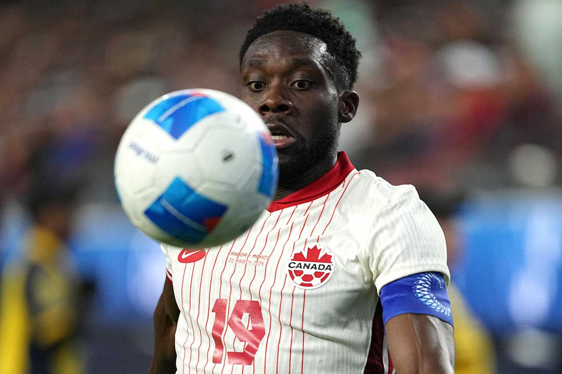 INGLEWOOD, CALIFORNIA - MARCH 20: Alphonso Davies #19 of Canada controls the ball against Mexico during the first half of a CONCACAF Nations League semifinal match at SoFi Stadium on March 20, 2025 in Inglewood, California. (Photo by Michael Owens/Getty Images)