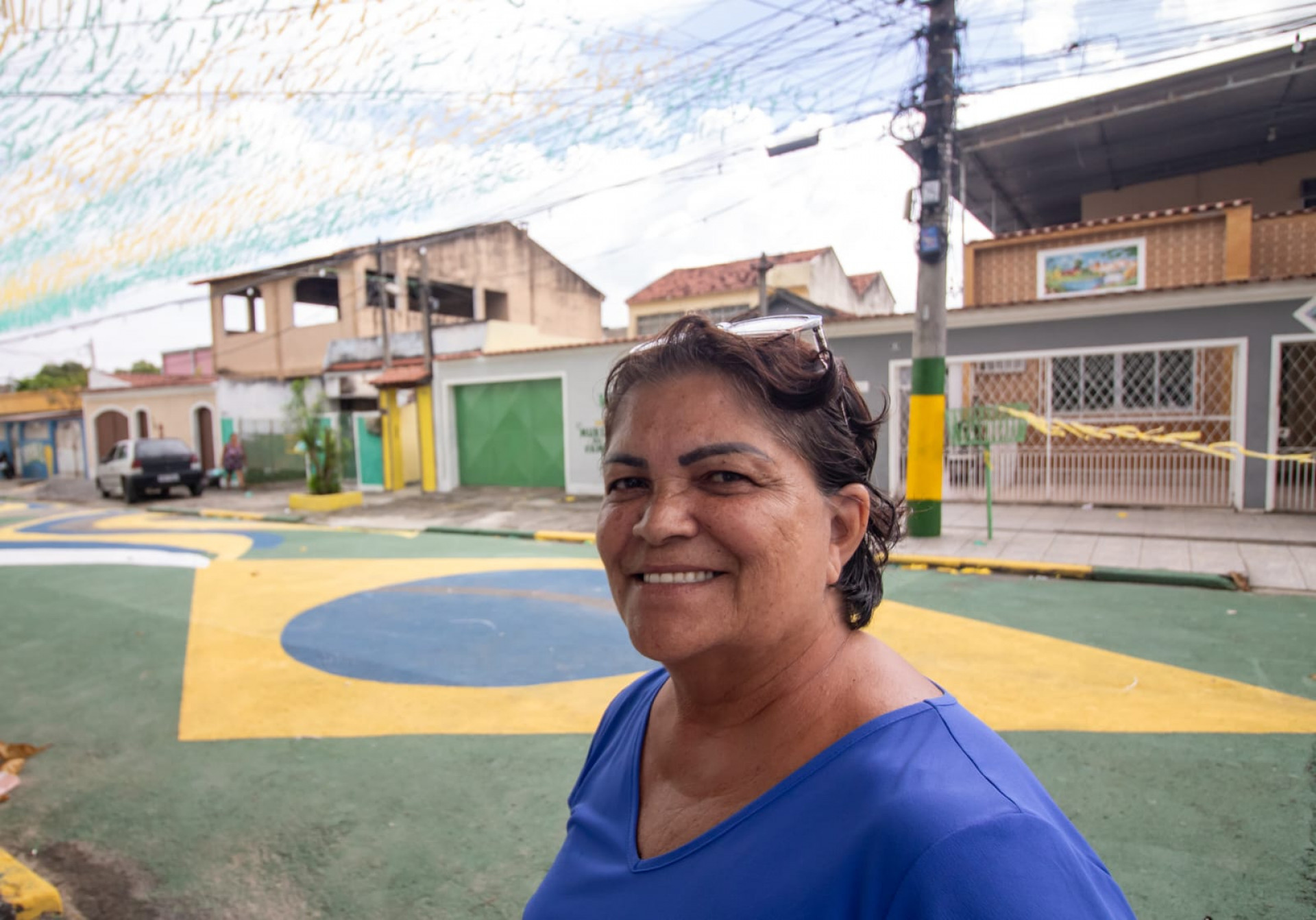 Tânia Alves, faz comidas durante os mutirões de pintura na Rua Taturana - Érica Martins/Agência O DIA