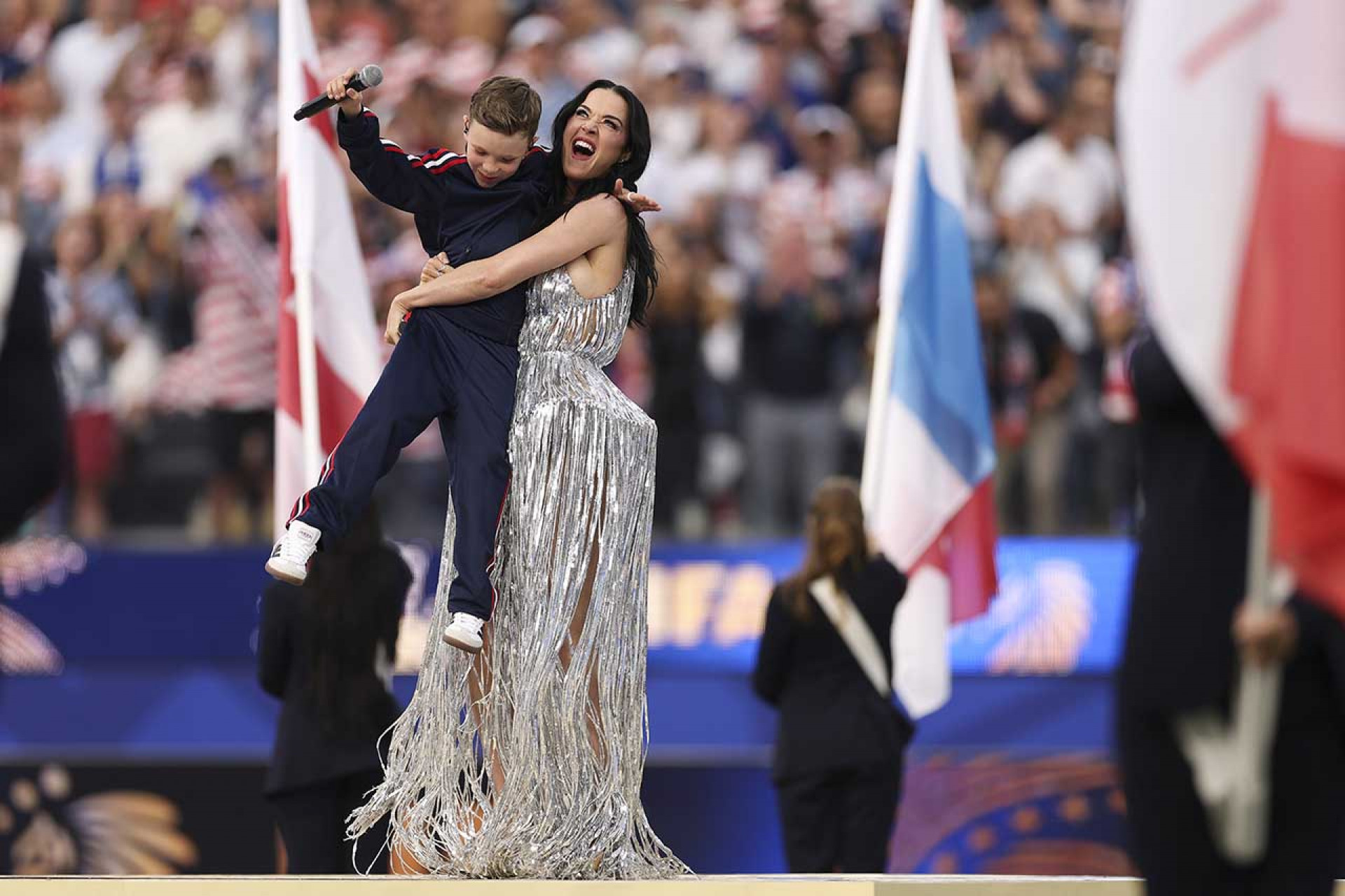 LOS ANGELES, CALIFORNIA - JUNE 12: Katy Perry performs during the Parade of Nations before the FIFA World Cup 2026 Group D match between USA and Paraguay at Los Angeles Stadium on June 12, 2026 in Los Angeles, California. (Photo by Richard Heathcote/Getty Images)