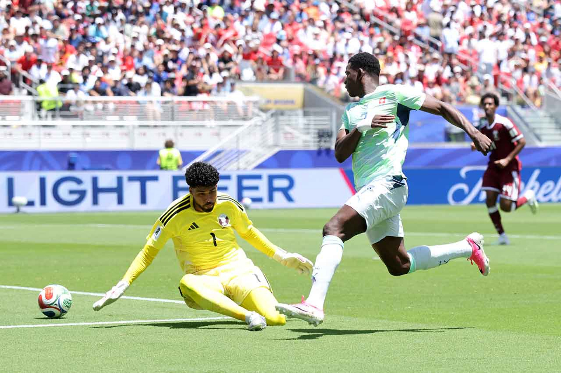 SANTA CLARA, CALIFORNIA - JUNE 13: Breel Embolo #7 of Switzerland shoots and misses a chance against Mahmoud Abunada #1 of Qatar during the FIFA World Cup 2026 Group B match between Qatar and Switzerland at San Francisco Bay Area Stadium on June 13, 2026 in Santa Clara, California. (Photo by Alex Grimm/Getty Images)