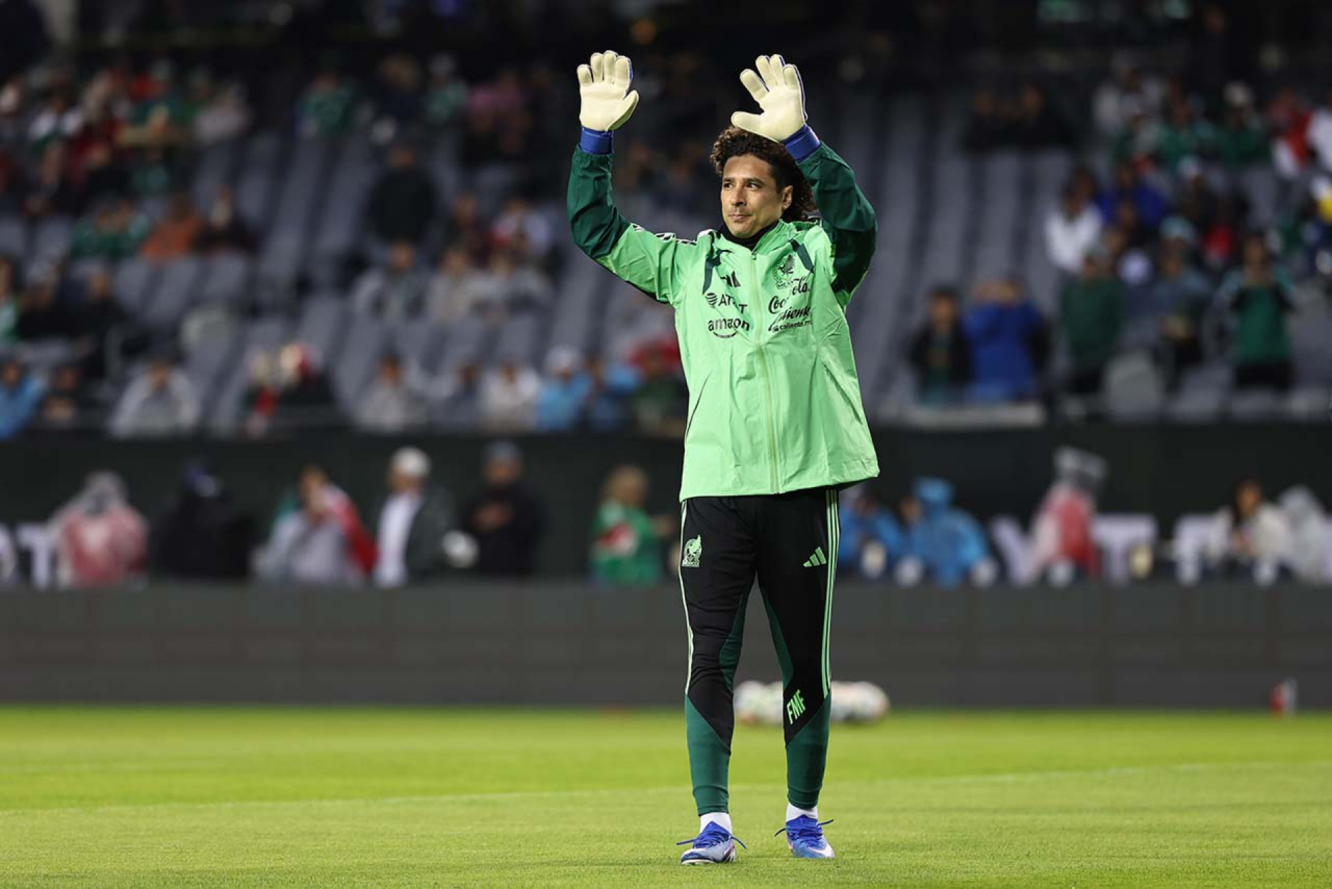 CHICAGO, ILLINOIS - MARCH 31: Guillermo Ochoa #13 of Mexico waves to fans before a game against Belgium at Soldier Field on March 31, 2026 in Chicago, Illinois. (Photo by Geoff Stellfox/Getty Images)