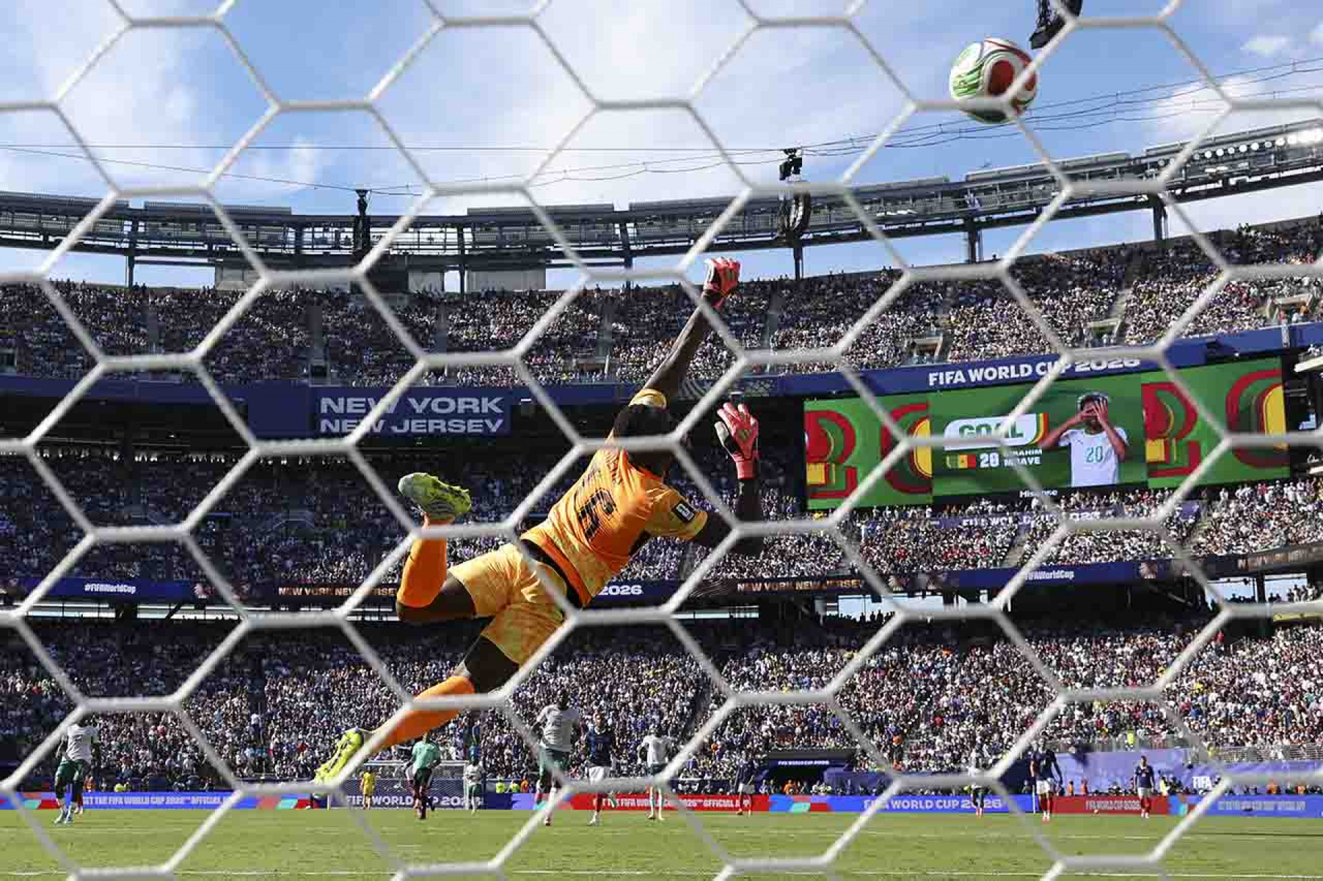 EAST RUTHERFORD, NEW JERSEY - JUNE 16: (EDITOR'S NOTE: Image was captured using a remote camera from behind the goal.) Edouard Mendy #16 of Senegal concedes a goal to Kylian Mbappe #10 of France during the FIFA World Cup 2026 Group I match between France and Senegal at New York New Jersey Stadium on June 16, 2026 in East Rutherford, New Jersey. The goal is France's third and Mbappe's second. (Photo by Dan Mullan/Getty Images)