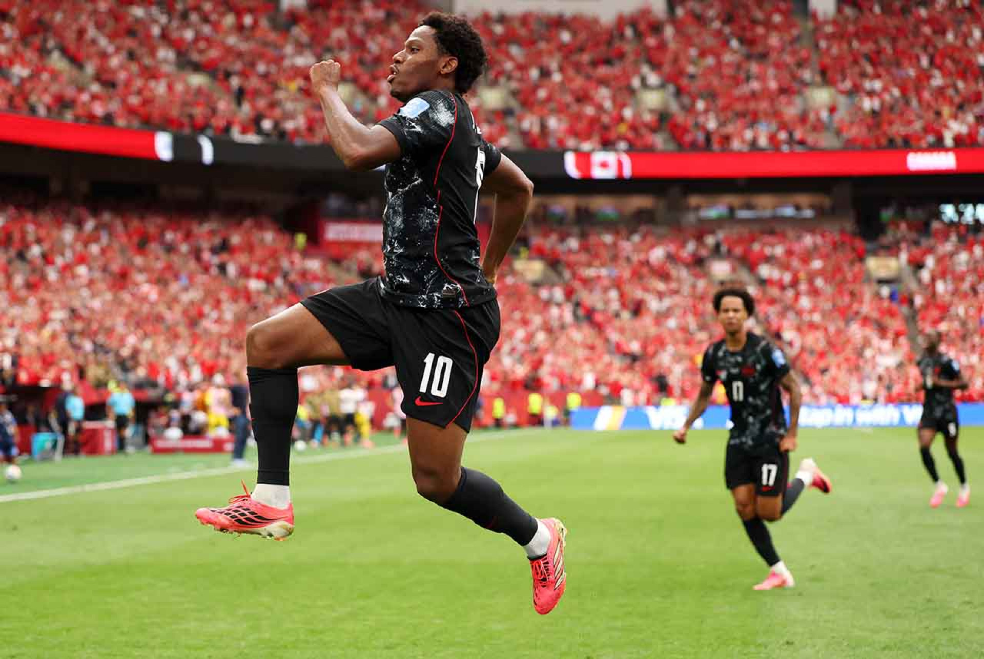 VANCOUVER, BRITISH COLUMBIA - JUNE 18: Jonathan David #10 of Canada celebrates scoring his team's second goal  during the FIFA World Cup 2026 Group B match between Canada and Qatar at BC Place Vancouver on June 18, 2026 in Vancouver, British Columbia. (Photo by Fran Santiago/Getty Images)
