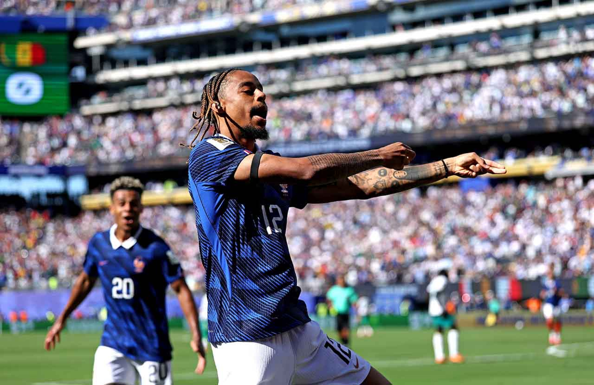 EAST RUTHERFORD, NEW JERSEY - JUNE 16: Bradley Barcola #12 of France celebrates scoring his team's second goal during the FIFA World Cup 2026 Group I match between France and Senegal at New York New Jersey Stadium on June 16, 2026 in East Rutherford, New Jersey. (Photo by Dan Mullan/Getty Images)