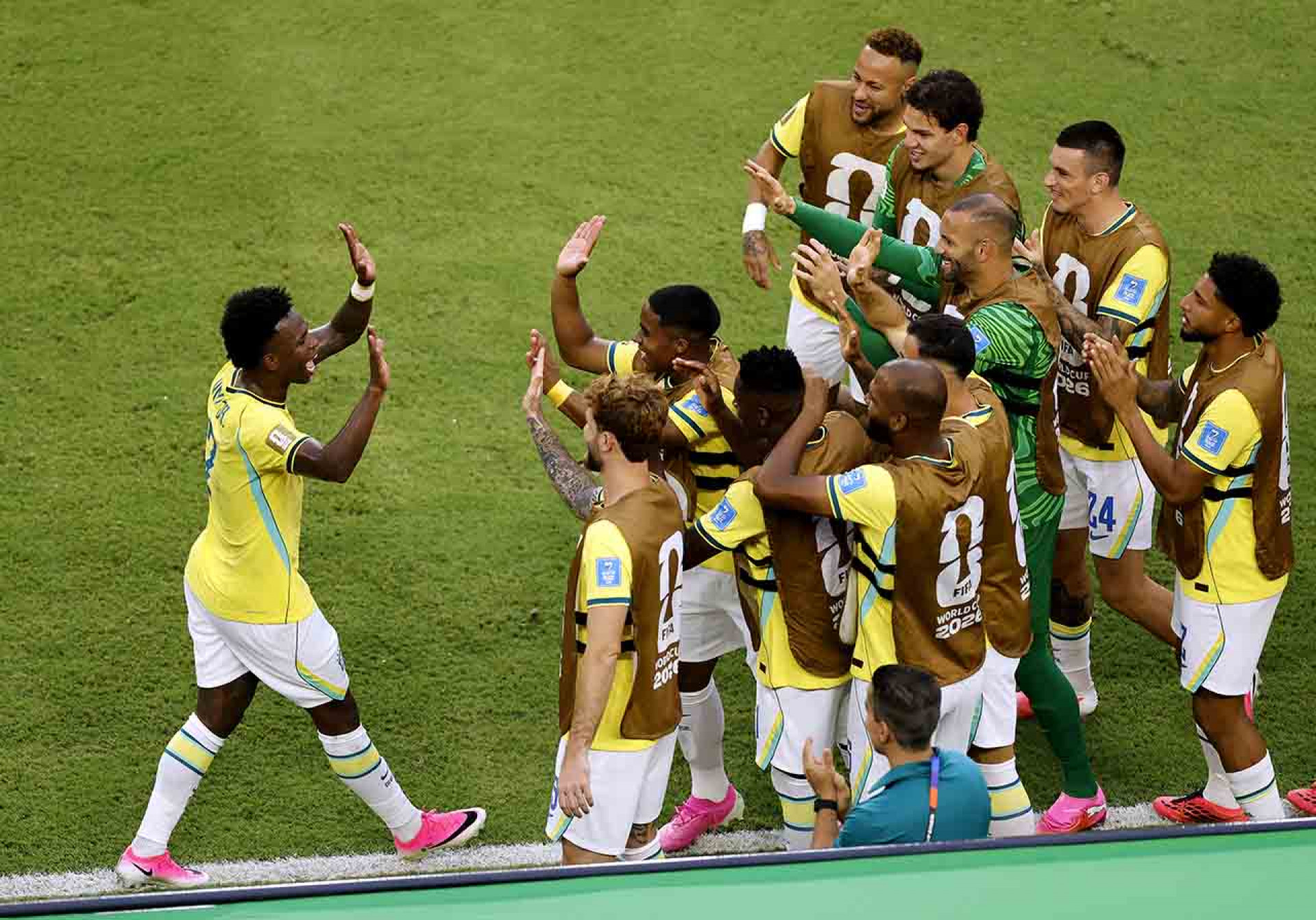 MIAMI GARDENS, FLORIDA - JUNE 24: Vinicius Junior #7 of Brazil celebrates with teammates after scoring the team's second goal during the FIFA World Cup 2026 Group C match between Scotland and Brazil at Miami Stadium on June 24, 2026 in Miami Gardens, Florida. (Photo by Michael Reaves/Getty Images)