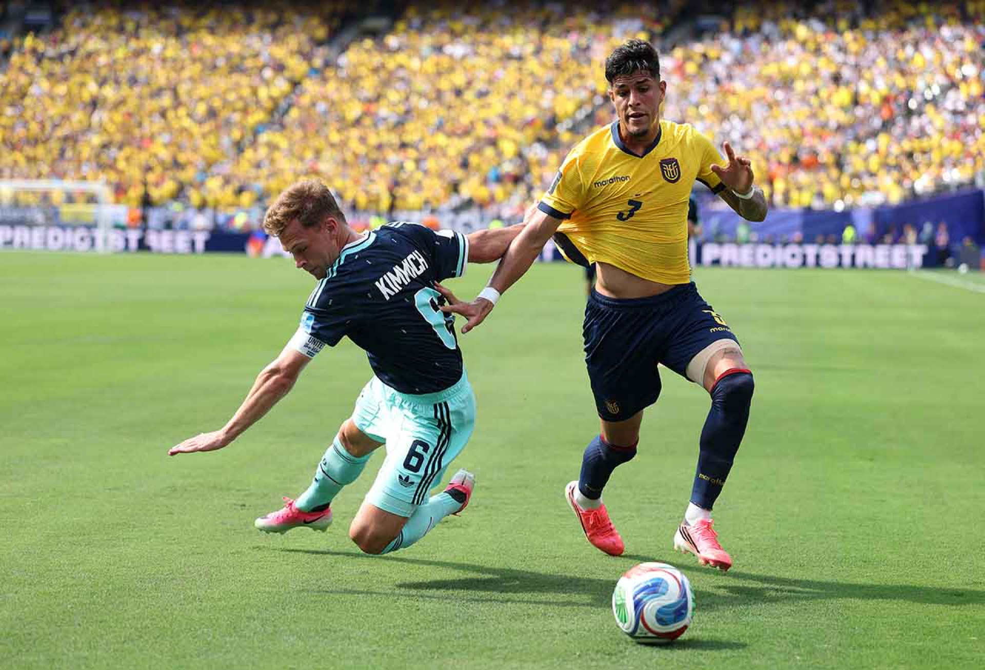 EAST RUTHERFORD, NEW JERSEY - JUNE 25: Joshua Kimmich #6 of Germany is challenged by Piero Hincapie #3 of Ecuador during the FIFA World Cup 2026 Group E match between Ecuador and Germany at New York New Jersey Stadium on June 25, 2026 in East Rutherford, New Jersey. (Photo by Justin Setterfield/Getty Images)