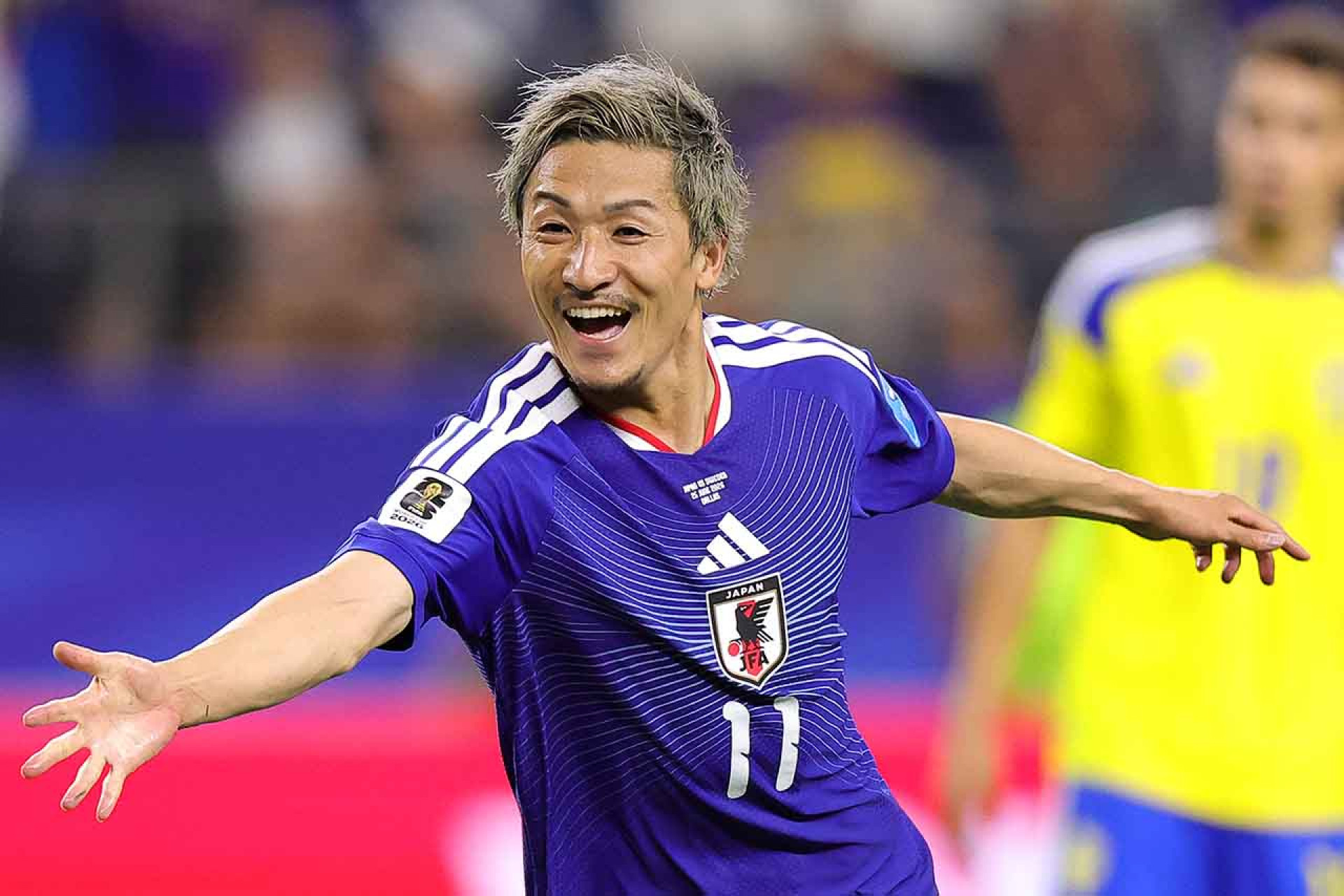 ARLINGTON, TEXAS - JUNE 25: Daizen Maeda #11 of Japan celebrates scoring his team's first goal during the FIFA World Cup 2026 Group F match between Japan and Sweden at Dallas Stadium on June 25, 2026 in Arlington, Texas. (Photo by Alex Slitz/Getty Images)