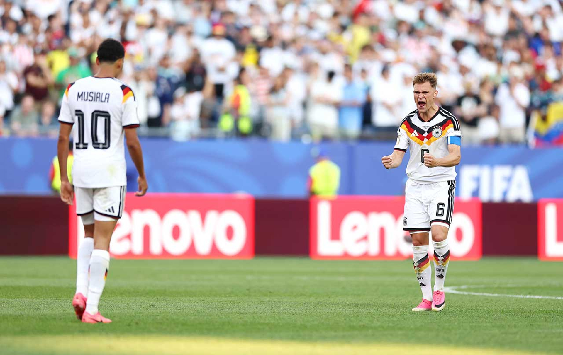 FOXBOROUGH, MASSACHUSETTS - JUNE 29: Joshua Kimmich #6 of Germany celebrates as Jamal Musiala #10 of Germany scores the team's third penalty during the penalty shootout during the FIFA World Cup 2026 Round Of 32 match between Germany and Paraguay at Boston Stadium on June 29, 2026 in Foxborough, Massachusetts. (Photo by Megan Briggs/Getty Images)