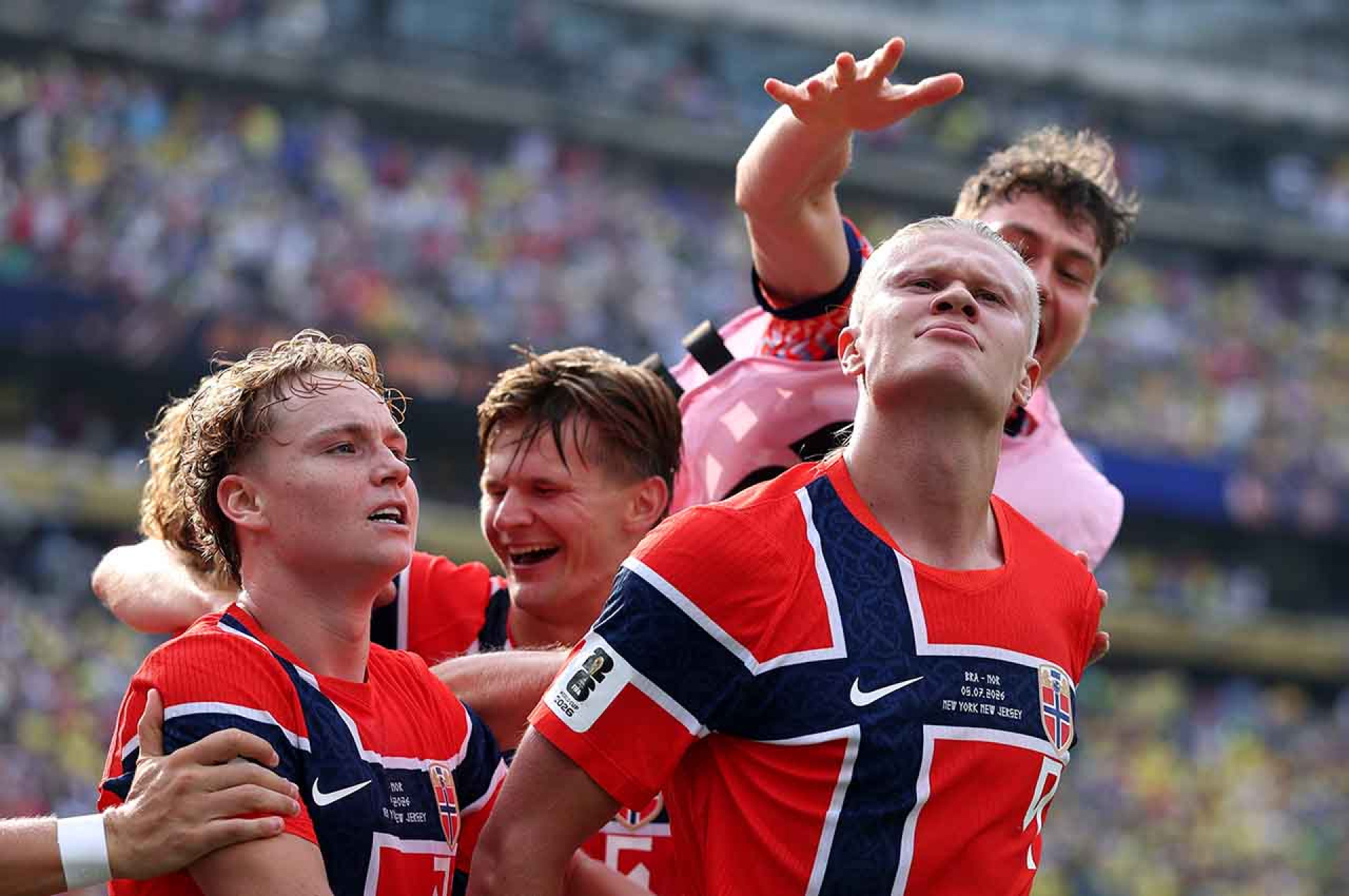 EAST RUTHERFORD, NEW JERSEY - JULY 05: Erling Haaland #9 of Norway celebrates with teammates after scoring his team's second goal during the FIFA World Cup 2026 Round of 16 match between Brazil and Norway at New York New Jersey Stadium on July 05, 2026 in East Rutherford, New Jersey. (Photo by Al Bello/Getty Images)