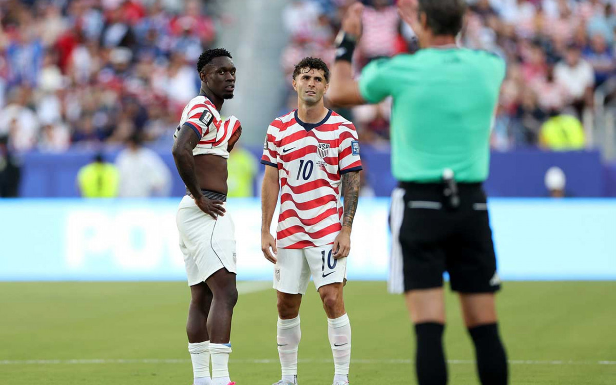 SANTA CLARA, CALIFORNIA - JULY 01: Folarin Balogun #20 and Christian Pulisic #10 of the United States reacts to him receiving a red card for a foul on Tarik Muharemovic #4 of Bosnia and Herzegovina during the FIFA World Cup 2026 Round of 32 match between USA and Bosnia and Herzegovina at San Francisco Bay Area Stadium on July 01, 2026 in Santa Clara, California. (Photo by Charlotte Wilson/Getty Images)
