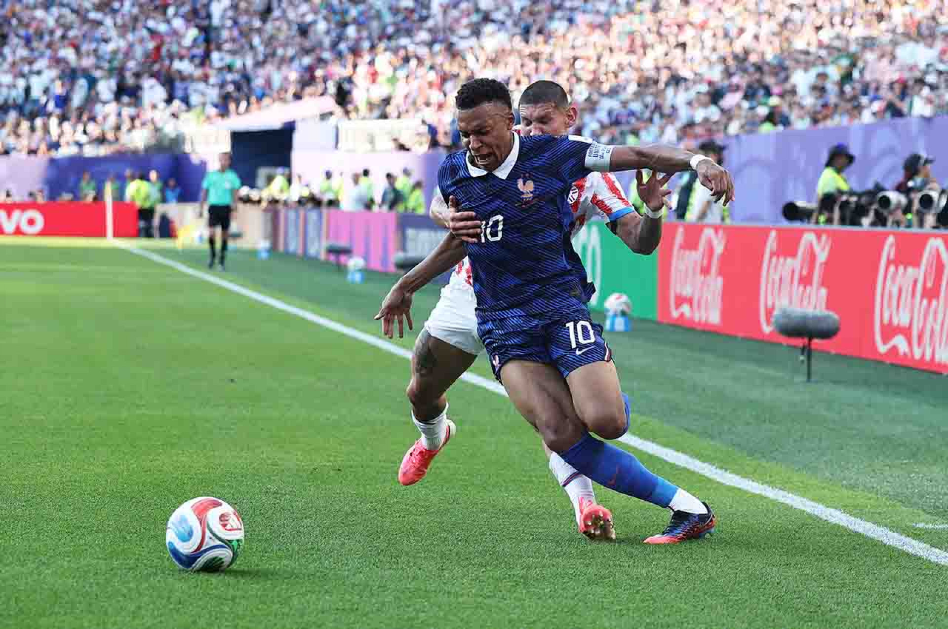 PHILADELPHIA, PENNSYLVANIA - JULY 04: Kylian Mbappe #10 of France is fouled by Juan Jose Caceres #4 of Paraguay during the FIFA World Cup 2026 Round of 16 match between Paraguay and France at Philadelphia Stadium on July 04, 2026 in Philadelphia, Pennsylvania. (Photo by Buda Mendes/Getty Images)