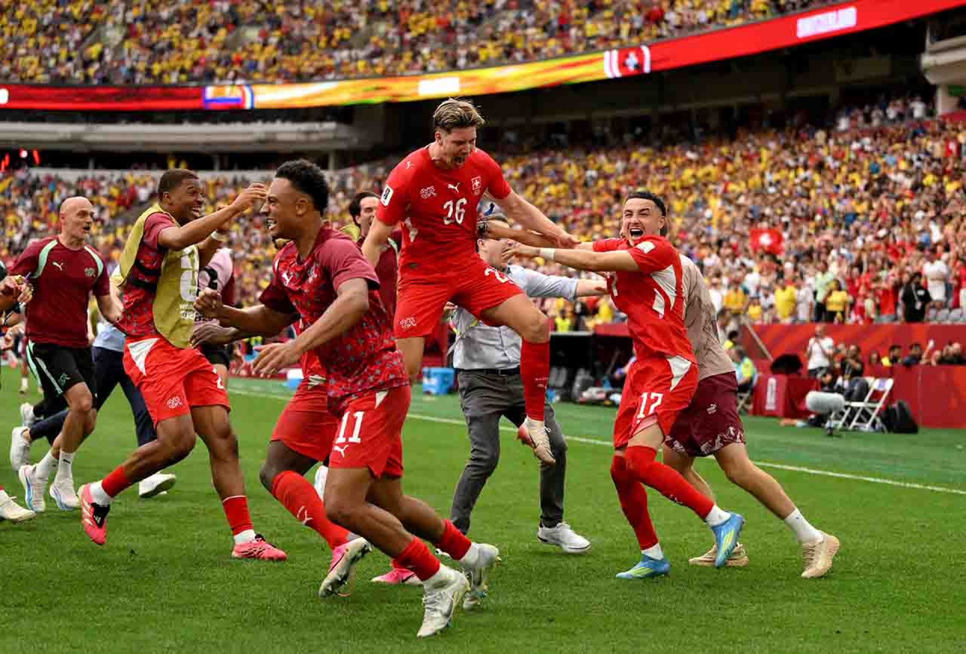 VANCOUVER, CANADA - JULY 07: Ruben Vargas #17 of Switzerland celebrates with teammates after scoring the fifth penalty in a penalty shootout for victory during the FIFA World Cup 2026 Round of 16 match between Switzerland and Colombia at BC Place Vancouver on July 07, 2026 in Vancouver, British Columbia, Canada. (Photo by David Ramos/Getty Images)