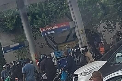 Dois homens são mortos a tiros em posto de combustíveis