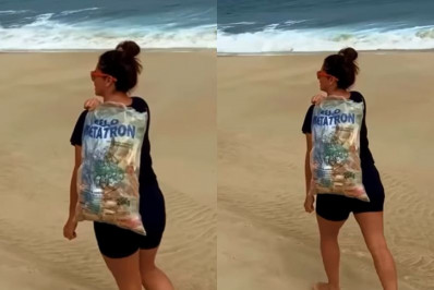 Giovanna Antonelli mostra indignação ao catar lixo em praia