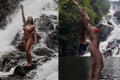 De biquíni, Juliana Paes curte dia de cachoeira
