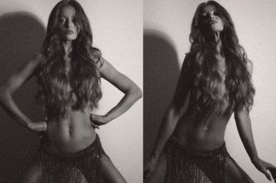 Após separação, Cintia Dicker posa de topless e Scooby reage