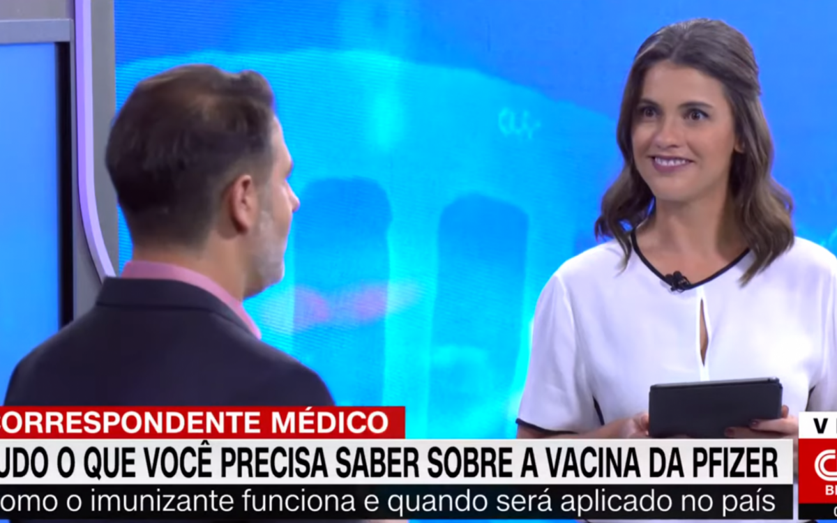 Elisa Veeck e Fernando Gomes (de costas) - Reprodução/CNN Brasil