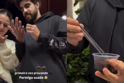 Caio Castro prova formiga pela primeira vez ao lado da namorada